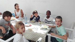 Kids having lunch with friends at Sevilla