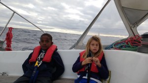 Kids tired sailing in the Atlantic