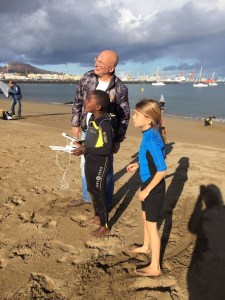 kids learning how to fly a drone