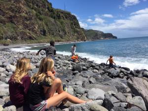 Dunia and Soledad kids jumping in the waves