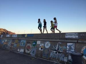 Dunia and Soledad kids running on the wall