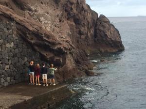 Dunia and Soledad kids watching Madeira coast